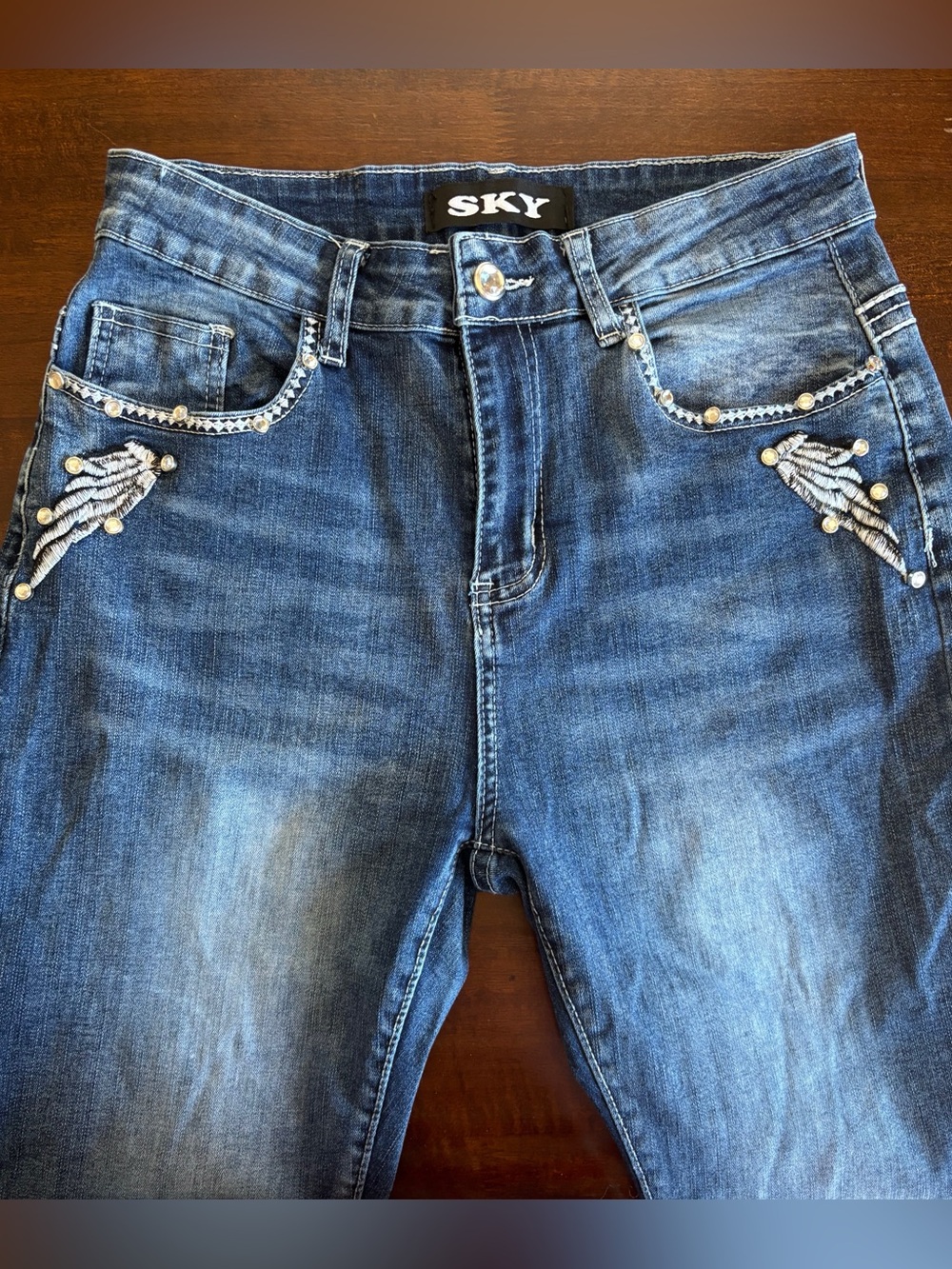 SKY Jeans - Women’s Flair Leg Jeans with  Bling Detail on the Pockets. Size 11